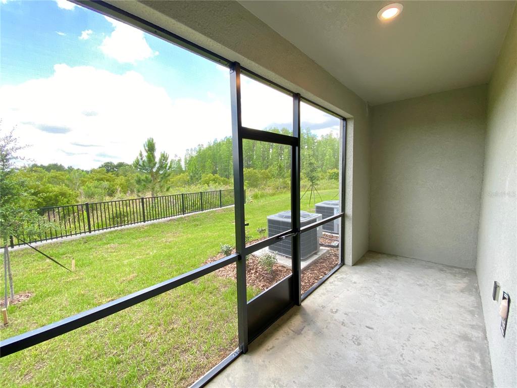 3523 Bellmeade Court Wesley Chapel, FL 33543 - Photo 20 of 22 a view of outdoor space with seating area