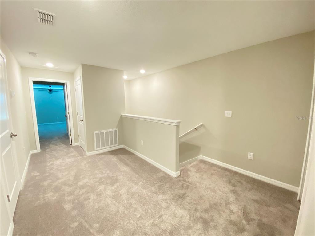 3523 Bellmeade Court Wesley Chapel, FL 33543 - Photo 7 of 22 an empty room with closet and windows