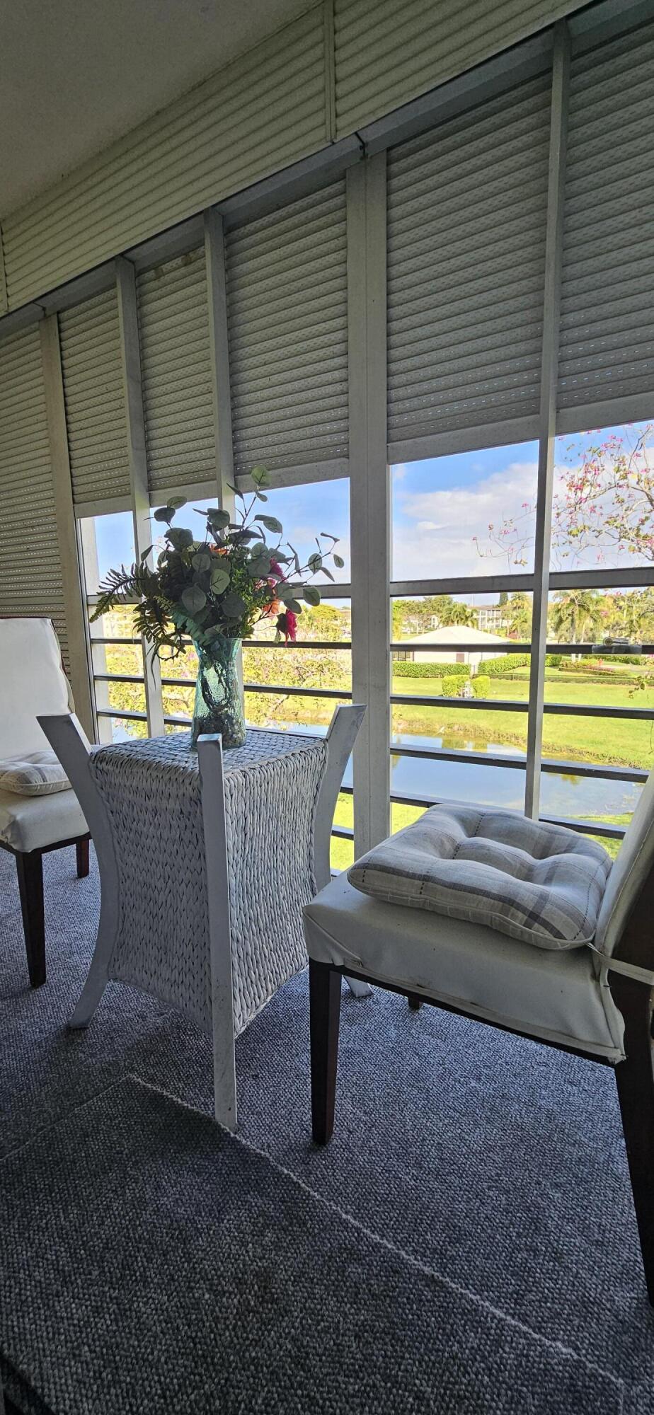 198 Preston Way, Unit 198 Boca Raton, FL 33434 - Photo 14 of 16 a view of outdoor space with seating