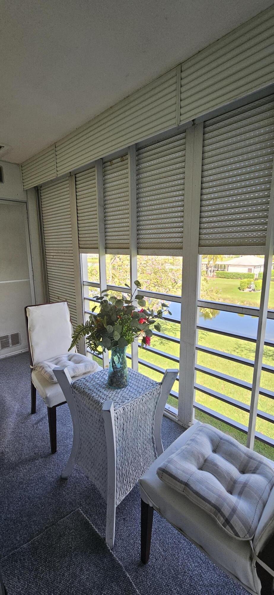 198 Preston Way, Unit 198 Boca Raton, FL 33434 - Photo 15 of 16 a room with furniture and a window