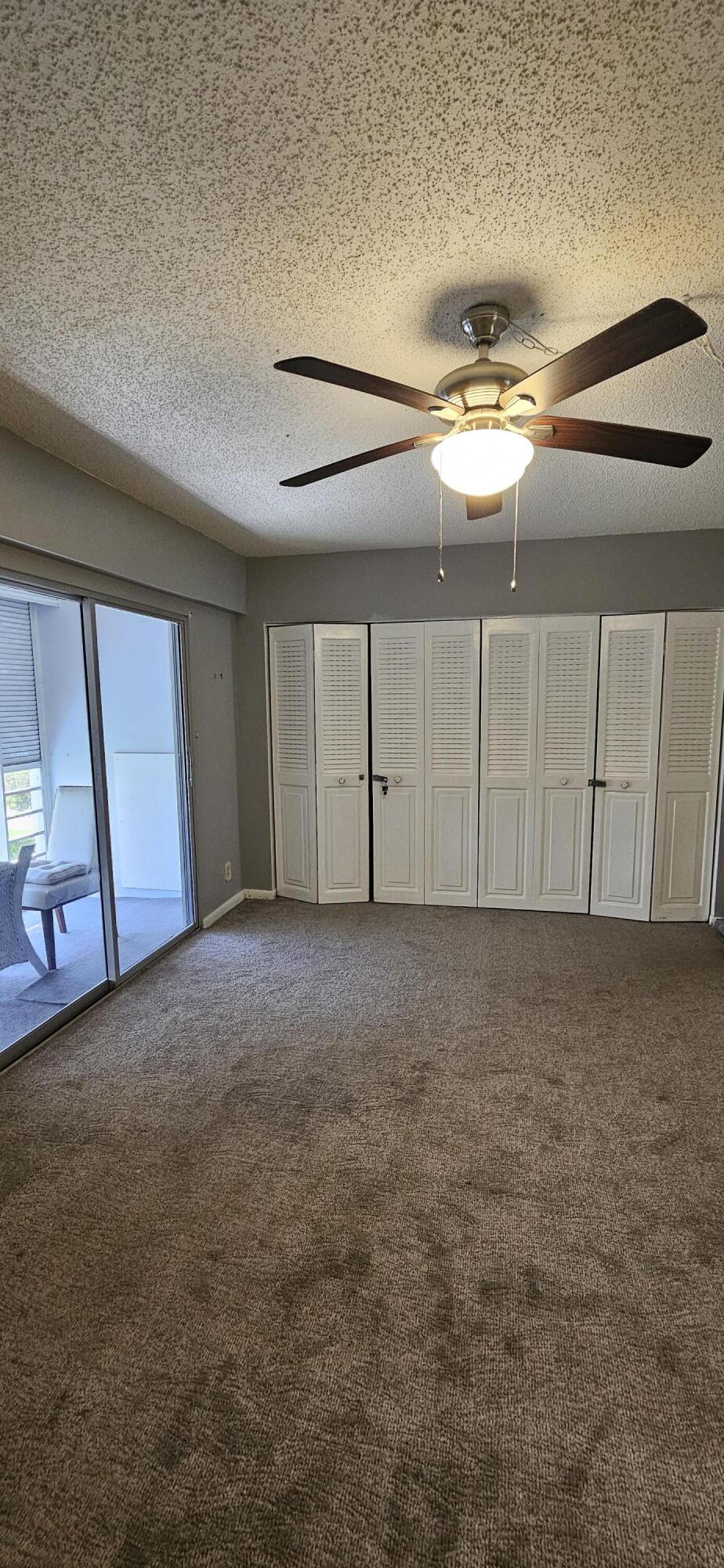 198 Preston Way, Unit 198 Boca Raton, FL 33434 - Photo 8 of 16 a view of an empty room