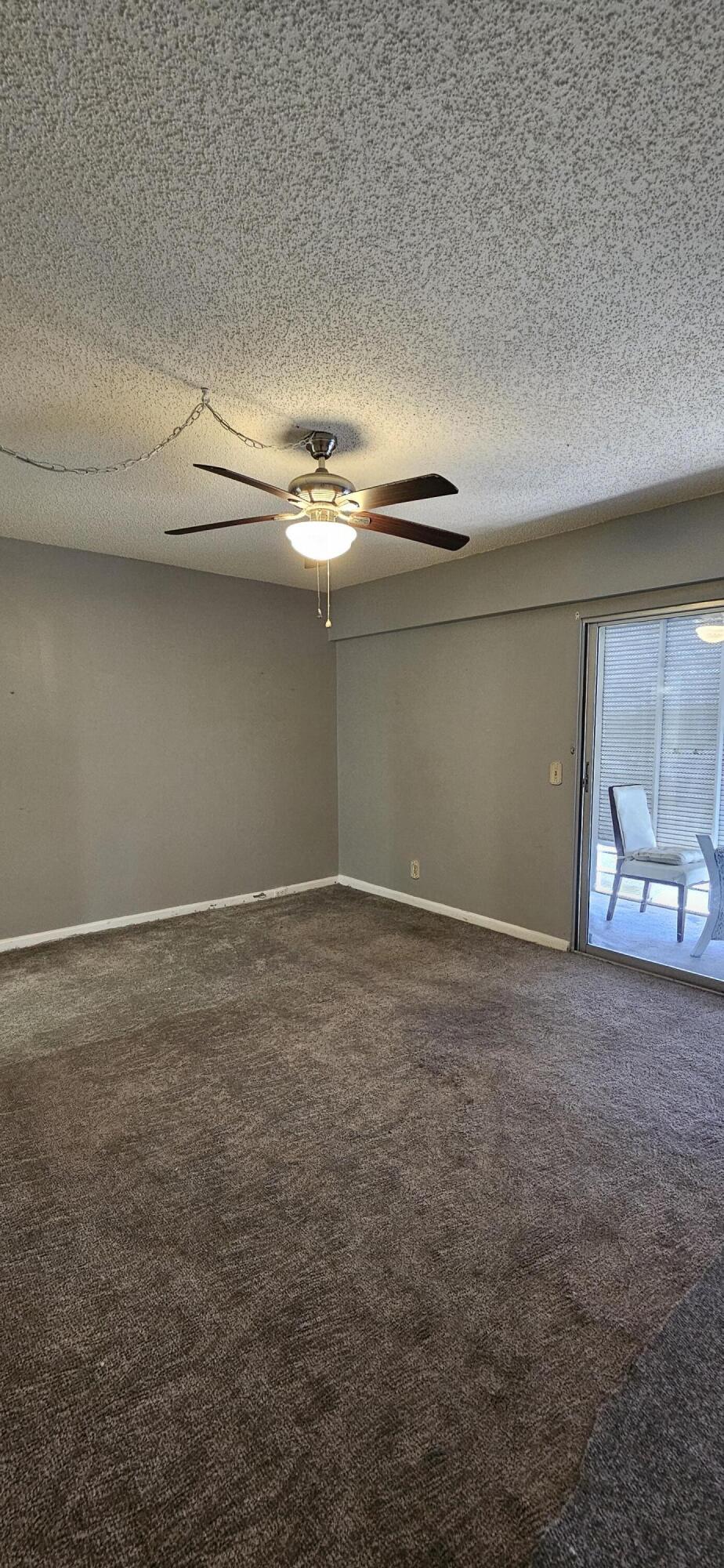 198 Preston Way, Unit 198 Boca Raton, FL 33434 - Photo 9 of 16 a view of empty room