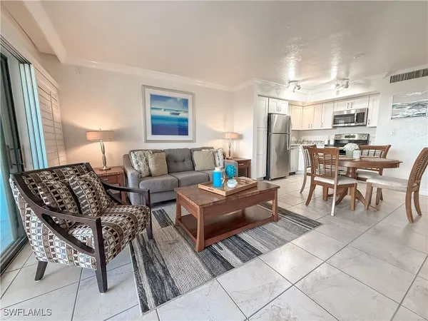 a living room with furniture and a table