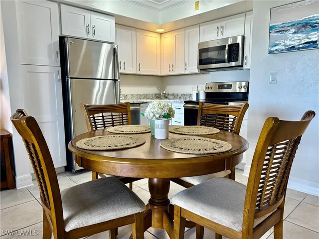 a view of a dining room with furniture