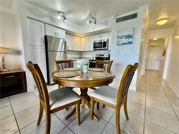 a view of a dining room with furniture