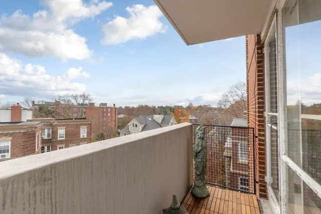 a view of a balcony with city view