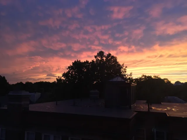 a sunset view with lake view