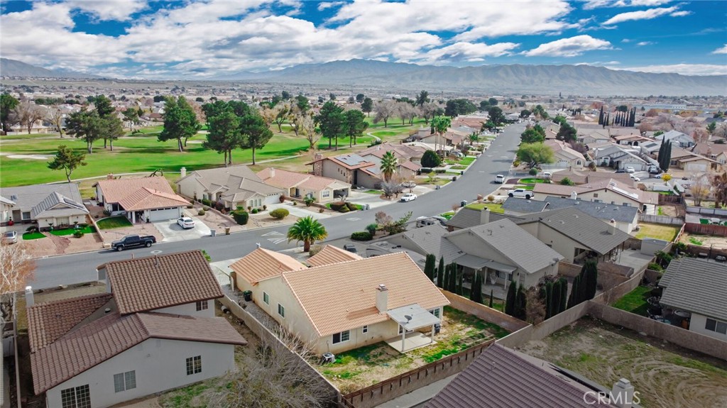 12794 Rain Shadow Road Victorville, CA 92395 - Photo 47 of 50 an aerial view of a house with garden space and ocean view