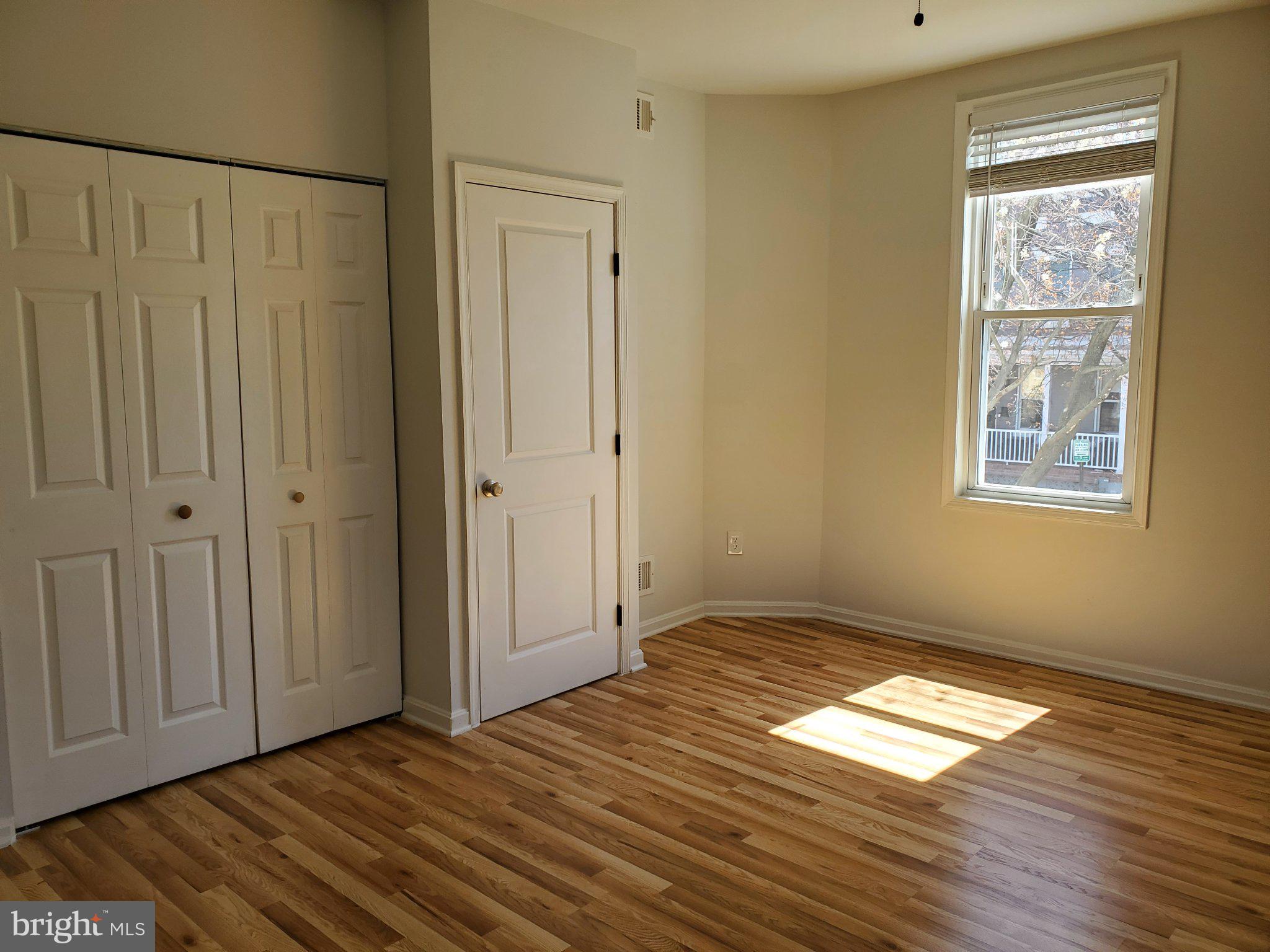 1200 D Street Northeast Washington, DC 20002 - Photo 15 of 35 a view of empty room with wooden floor and fan