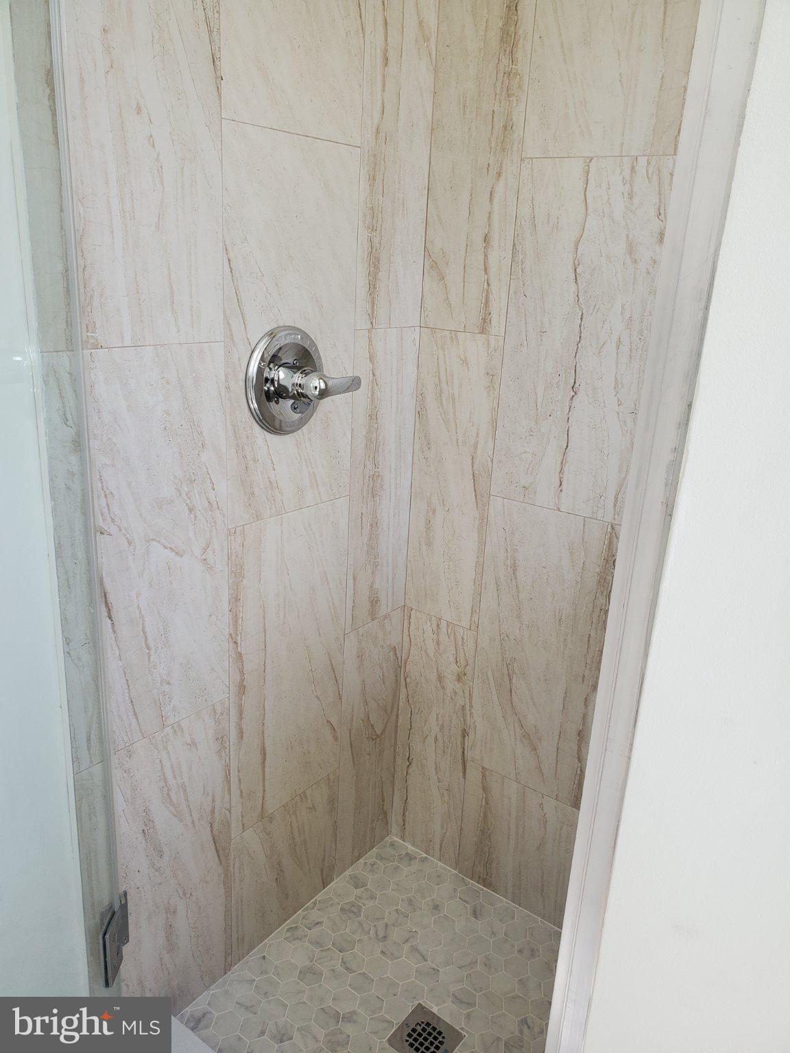 1200 D Street Northeast Washington, DC 20002 - Photo 17 of 35 a bathroom with a shower