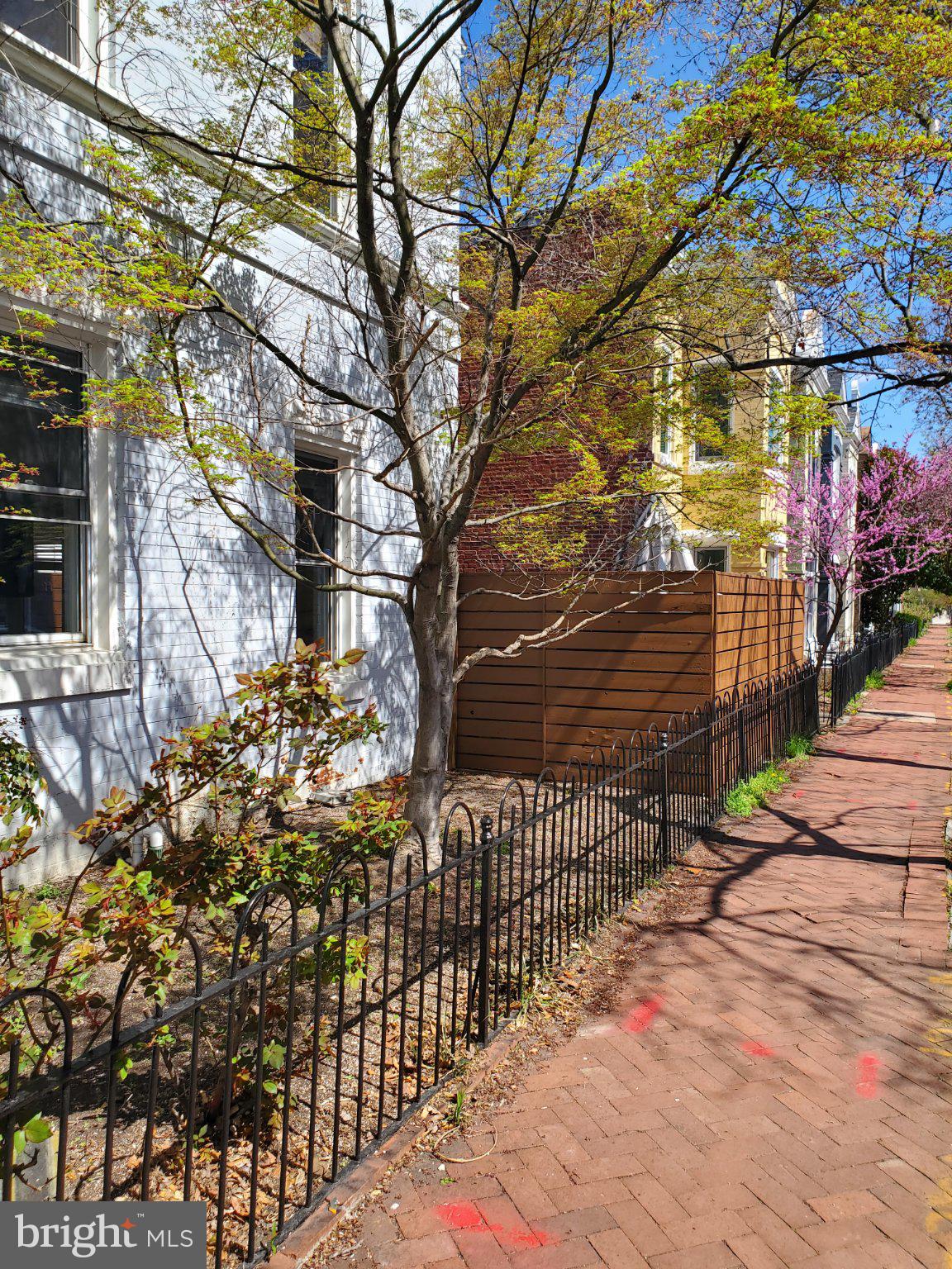 1200 D Street Northeast Washington, DC 20002 - Photo 2 of 35 a view of a pathway with a yard