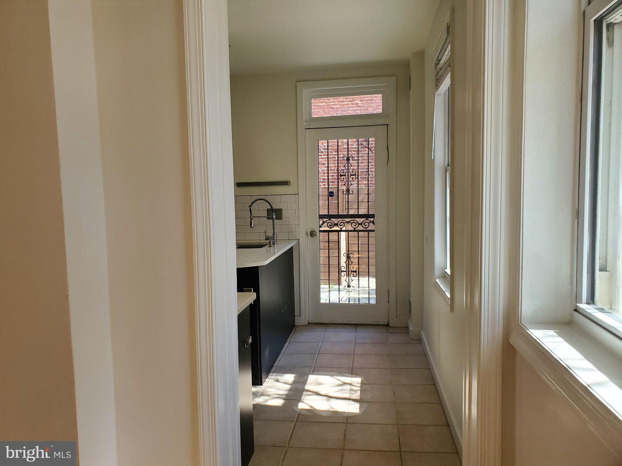 1200 D Street Northeast Washington, DC 20002 - Photo 28 of 35 a view of entryway with a white bath tub and door