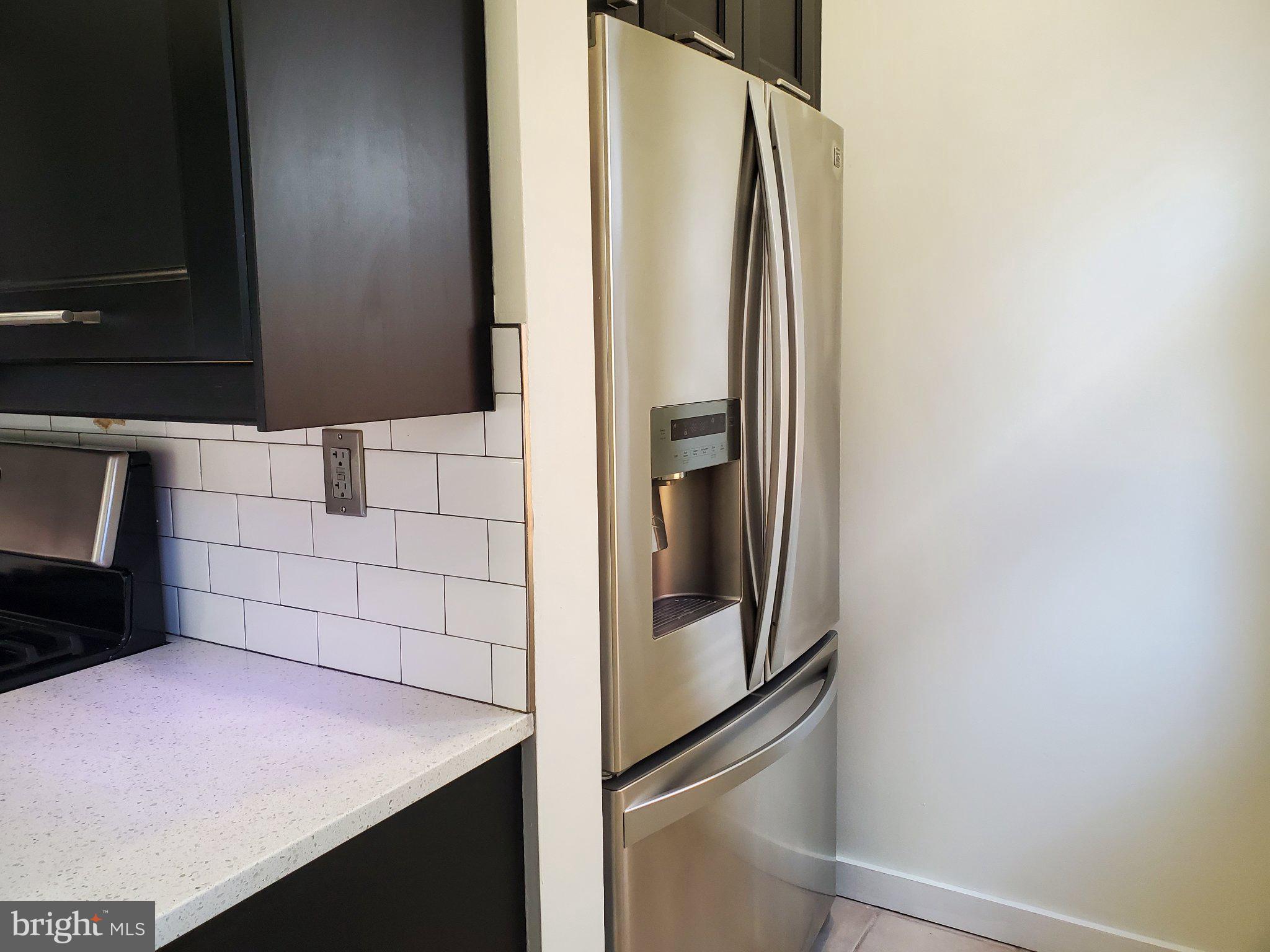 1200 D Street Northeast Washington, DC 20002 - Photo 31 of 35 a bathroom with a sink and a mirror