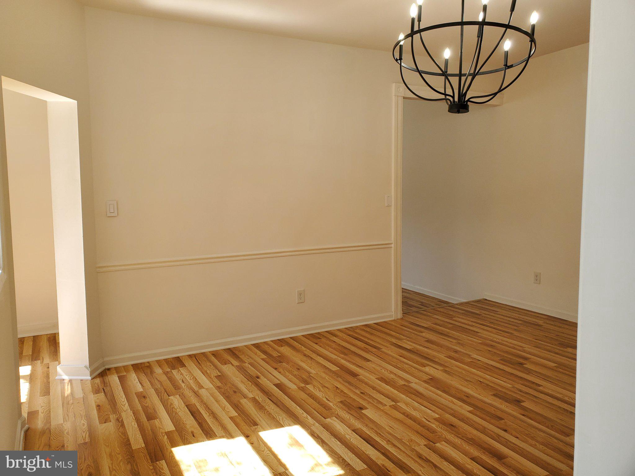 1200 D Street Northeast Washington, DC 20002 - Photo 34 of 35 a view of a room with wooden floor and a window