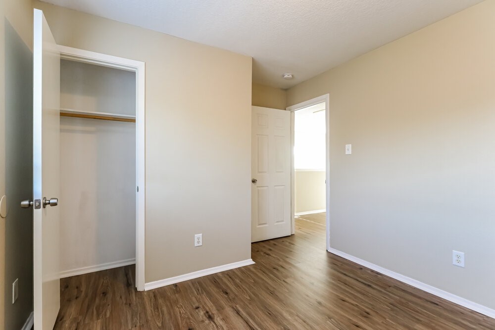 1207 Verde Trails Drive Houston, TX 77073 - Photo 15 of 17 an empty room with wooden floor & closet