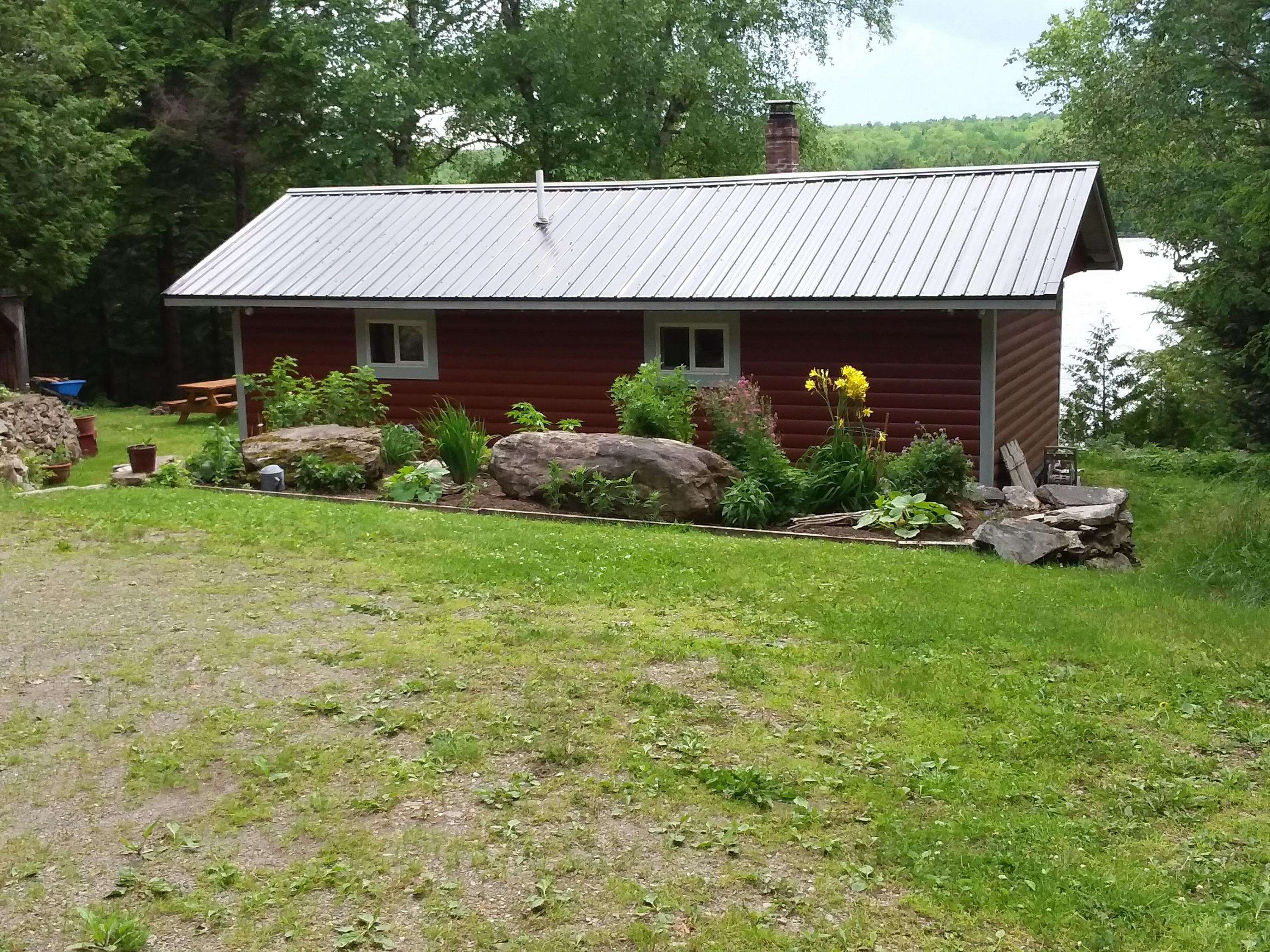 202 South Molunkus Road Mattawamkeag, ME 04459 - Photo 10 of 51 Back view of home...