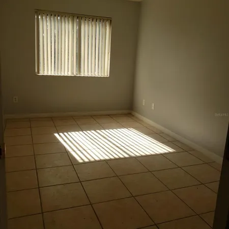 a close view of dining table with chairs
