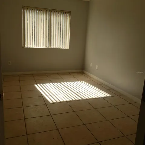 a close view of dining table with chairs