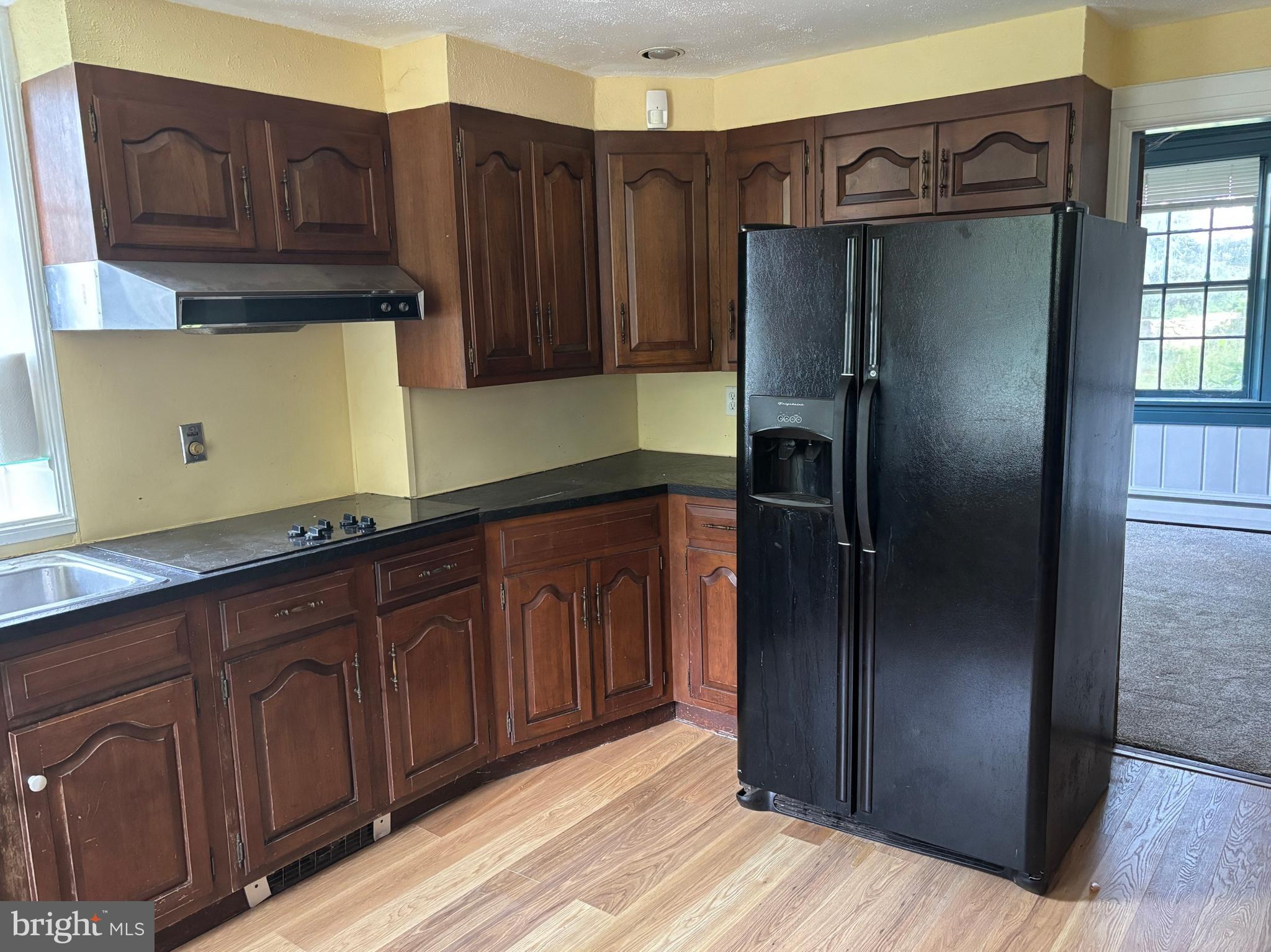 560 Basehoar Roth Road Littlestown, PA 17340 - Photo 5 of 145 a kitchen with stainless steel appliances granite countertop a refrigerator and a sink