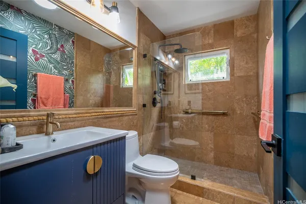 a room with wooden furniture and a window