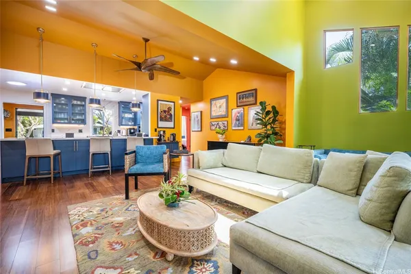 a view of a patio with table and chairs and potted plants