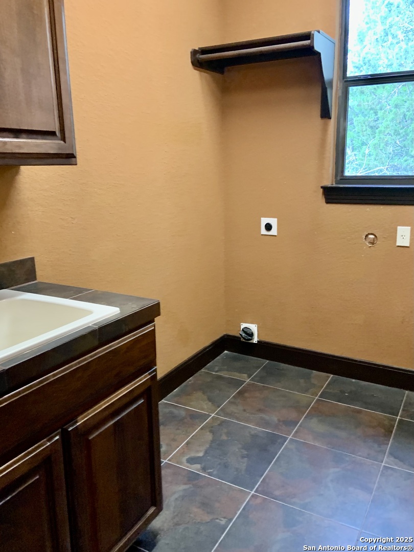 19940 Scenic Loop Road San Antonio, TX 78255 - Photo 19 of 34 a view of utility room