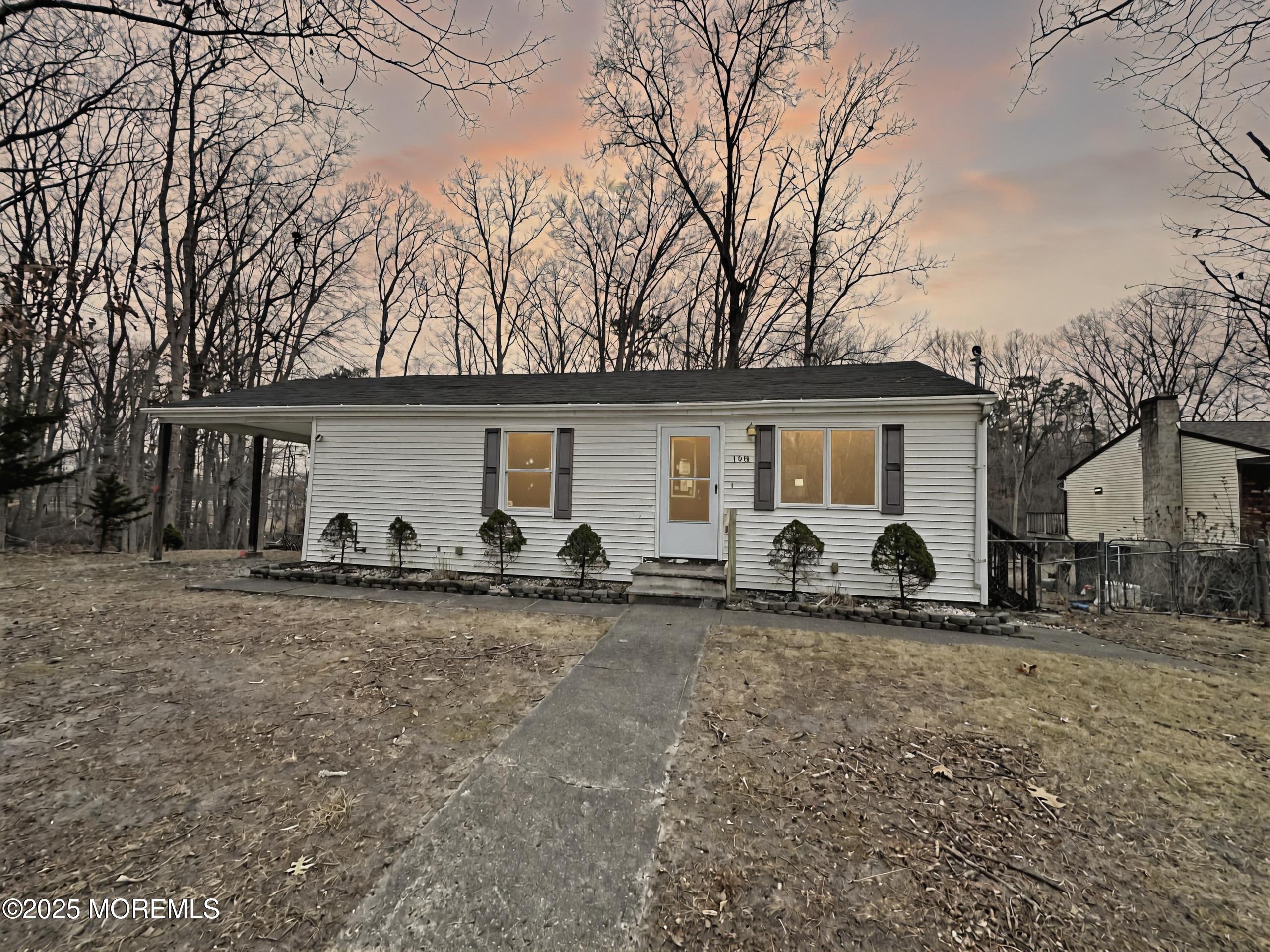 198 Lemon Road Farmingdale, NJ 07727 - Photo 1 of 13 a view of a house with backyard