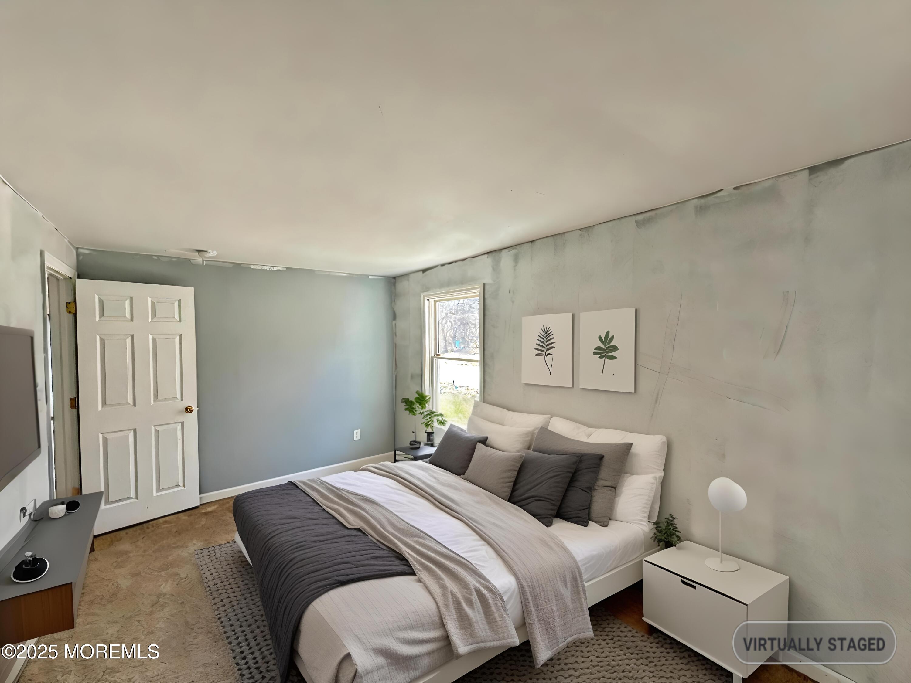 198 Lemon Road Farmingdale, NJ 07727 - Photo 11 of 13 a bedroom with a bed and a flat screen tv