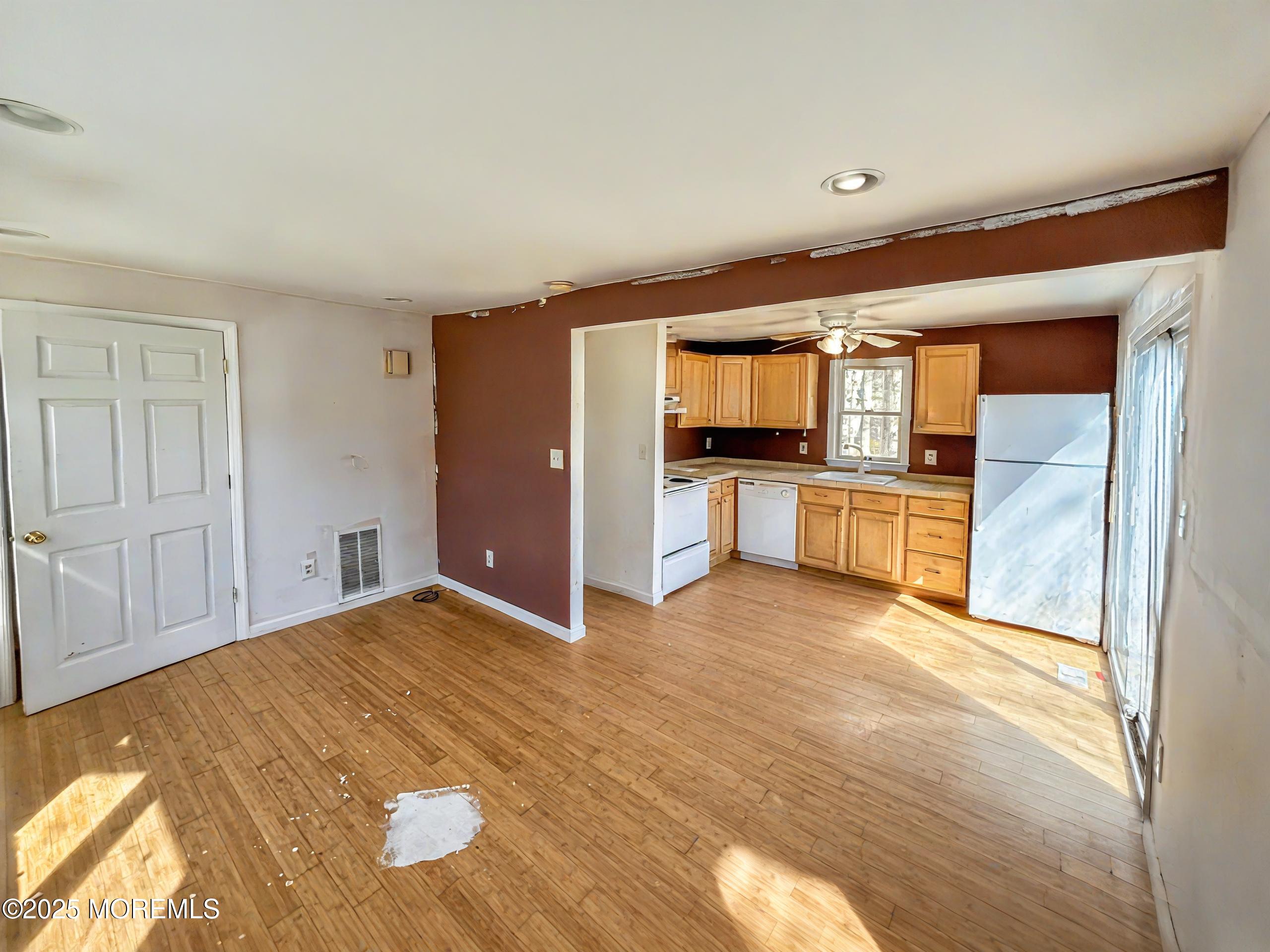 198 Lemon Road Farmingdale, NJ 07727 - Photo 6 of 13 a view of a kitchen with a sink and a stove top oven
