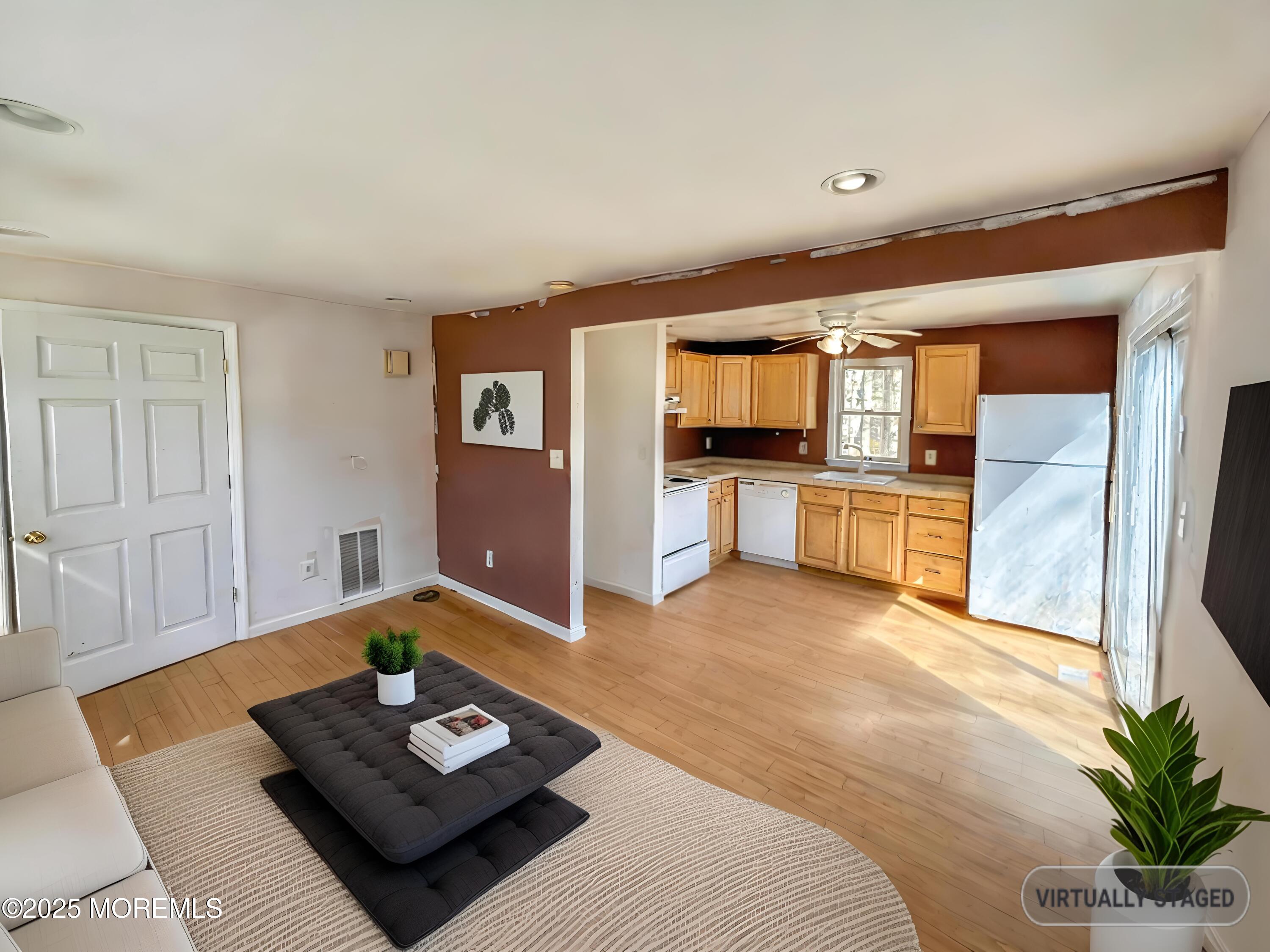 198 Lemon Road Farmingdale, NJ 07727 - Photo 7 of 13 a living room with furniture and wooden floor