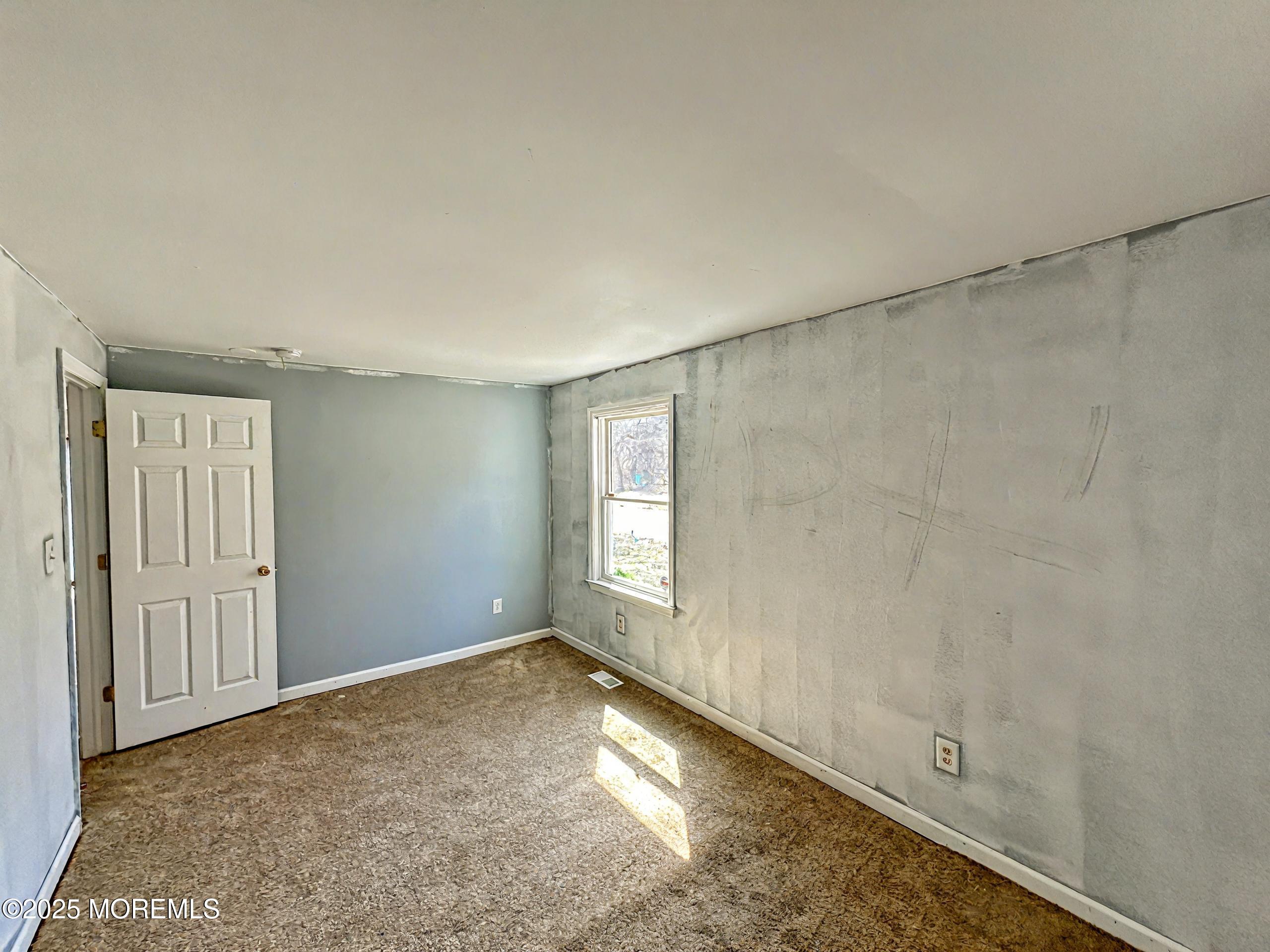 198 Lemon Road Farmingdale, NJ 07727 - Photo 10 of 13 a view of empty room with window