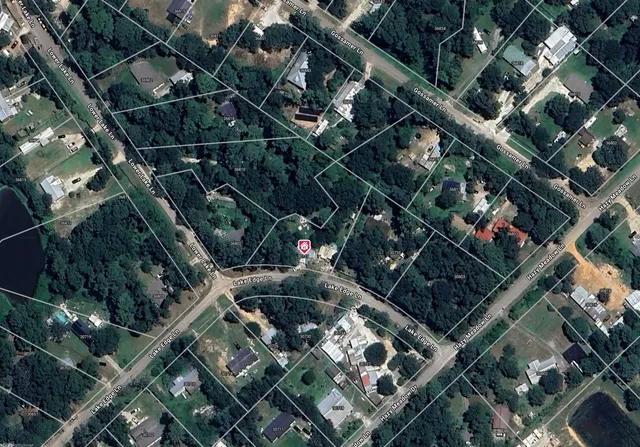 a backyard of a house with barbeque oven