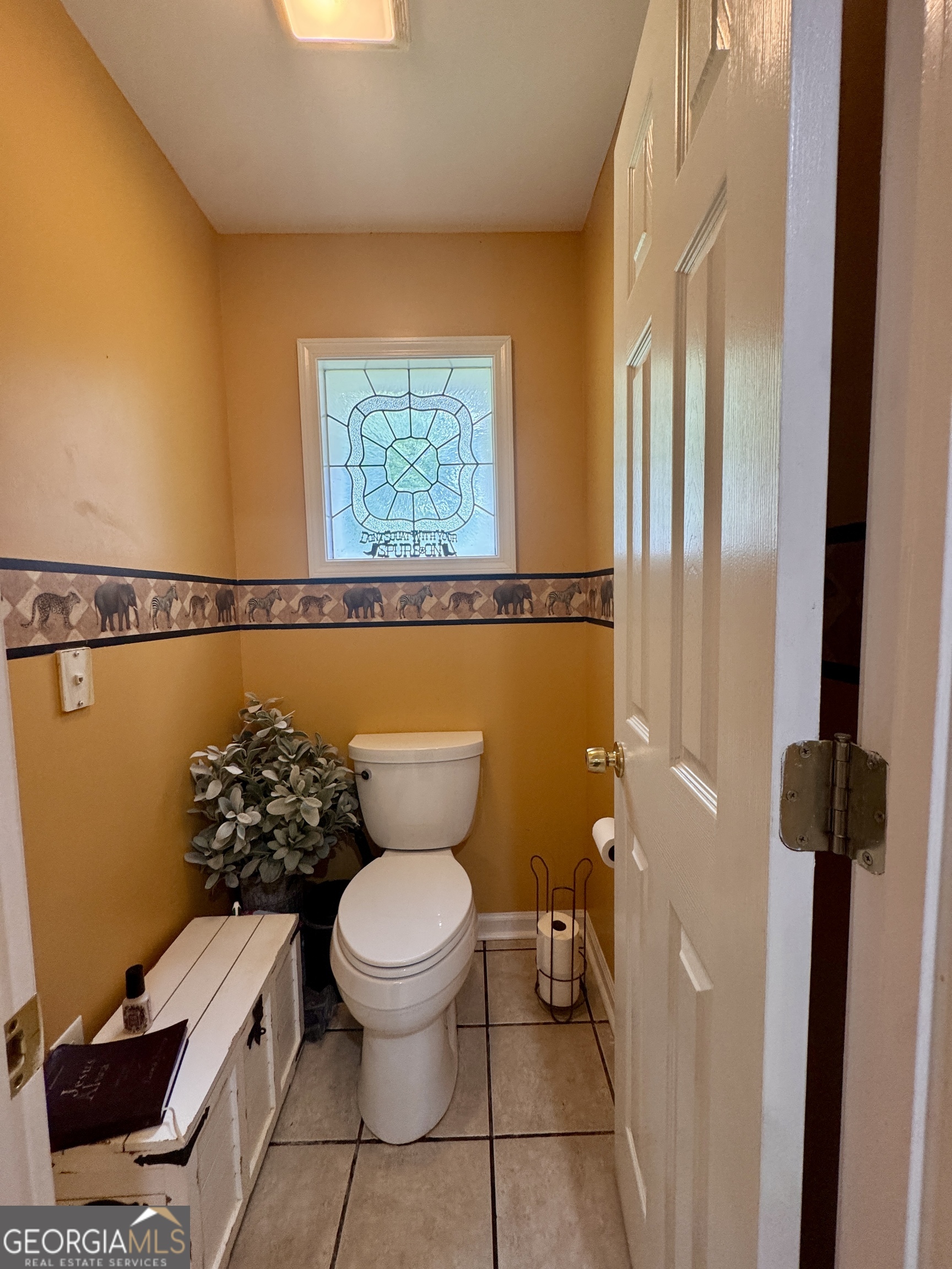 601 Cherokee Road LaGrange, GA 30240 - Photo 30 of 37 a bathroom with a toilet and a shower