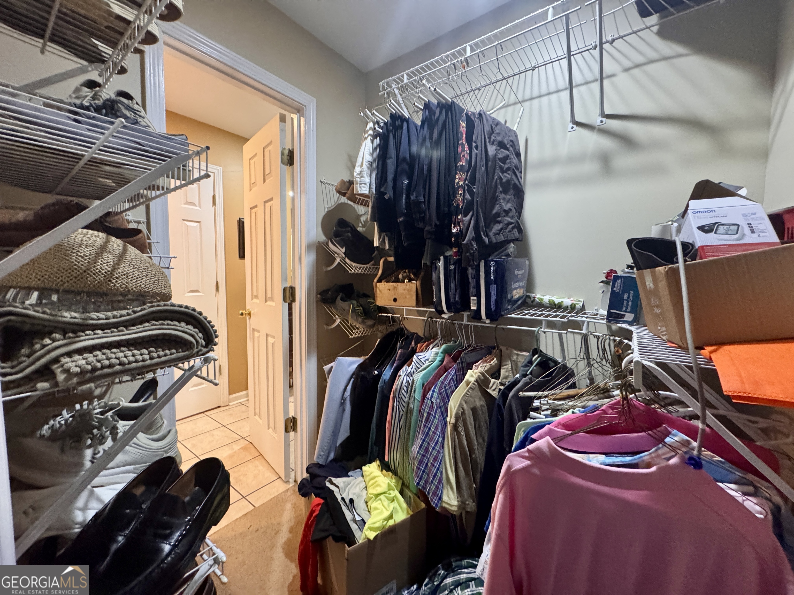 601 Cherokee Road LaGrange, GA 30240 - Photo 33 of 37 a view of walk in closet with clothes and shoes