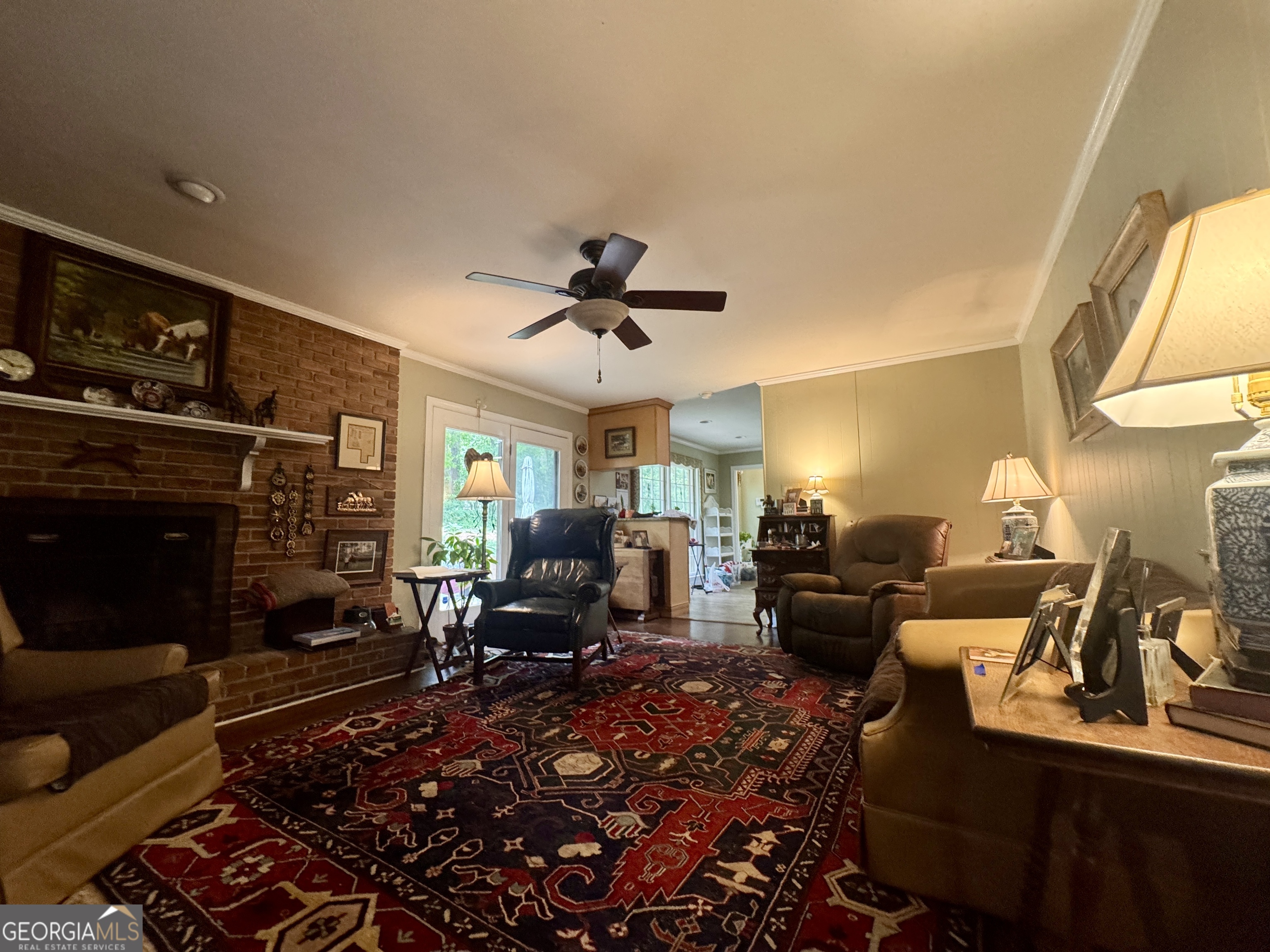 601 Cherokee Road LaGrange, GA 30240 - Photo 36 of 37 a living room with furniture a fireplace and a flat screen tv