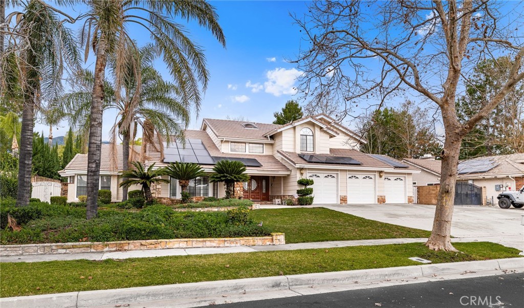 12732 Arena Drive Rancho Cucamonga, CA 91739 - Photo 1 of 61 a view of white house with a yard and plants