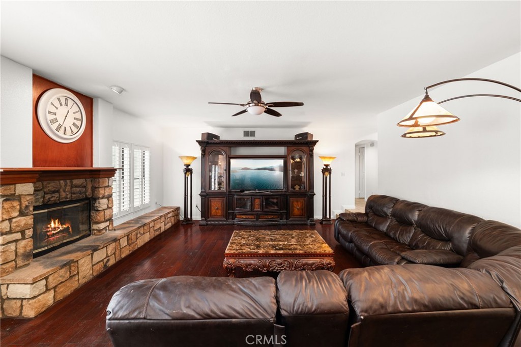 12732 Arena Drive Rancho Cucamonga, CA 91739 - Photo 12 of 61 a living room with furniture and a fireplace