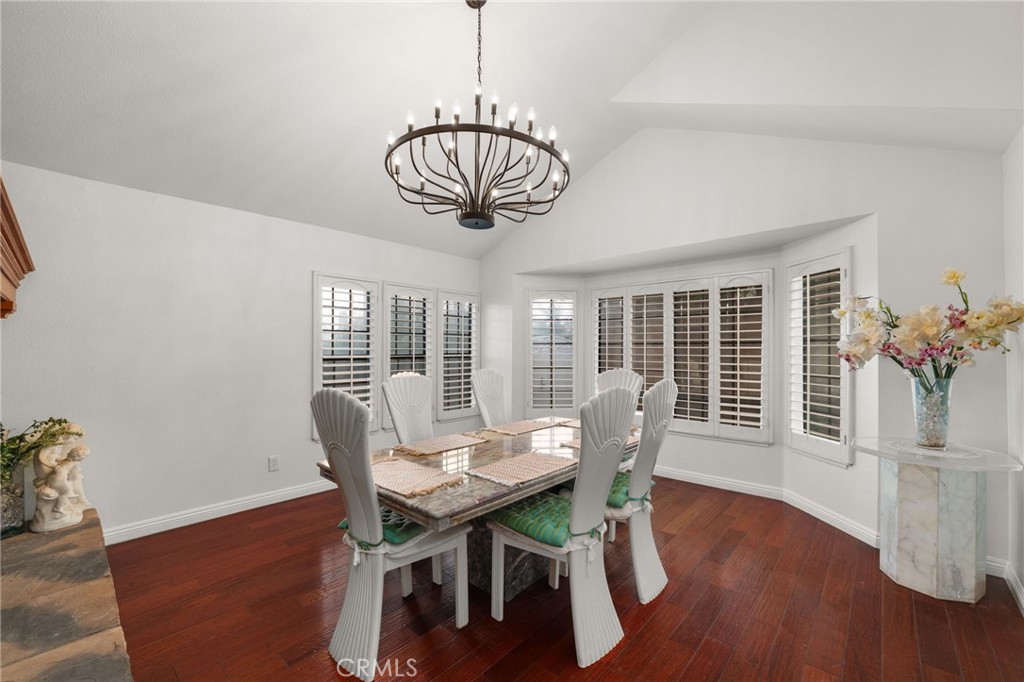 12732 Arena Drive Rancho Cucamonga, CA 91739 - Photo 22 of 61 a view of a dining room with furniture window and wooden floor