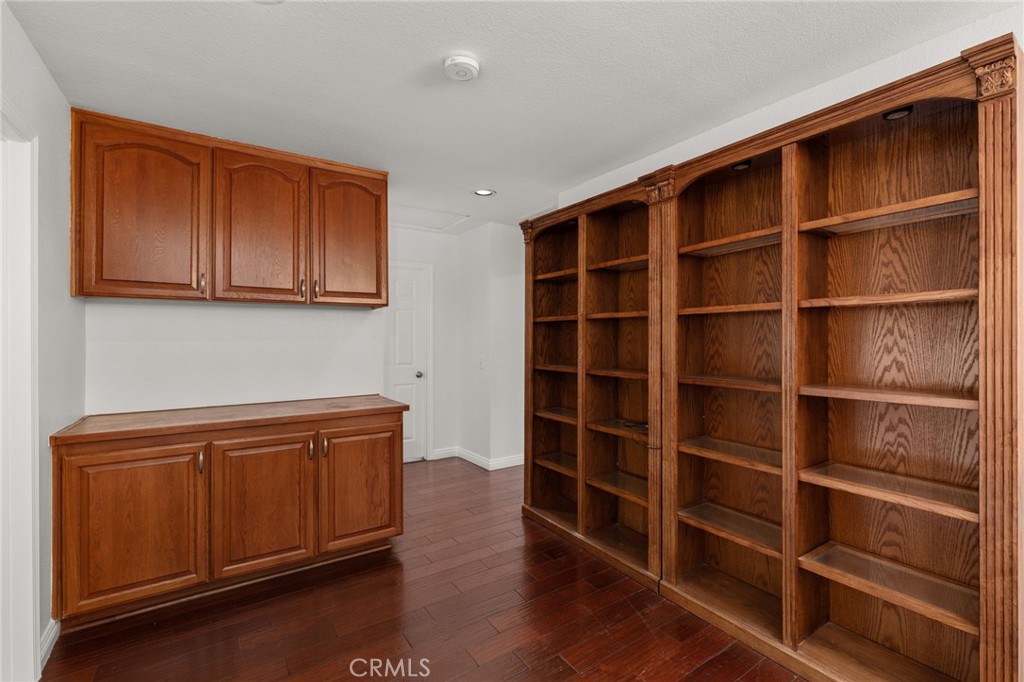 12732 Arena Drive Rancho Cucamonga, CA 91739 - Photo 30 of 61 a view of an empty room with wooden floor and a window
