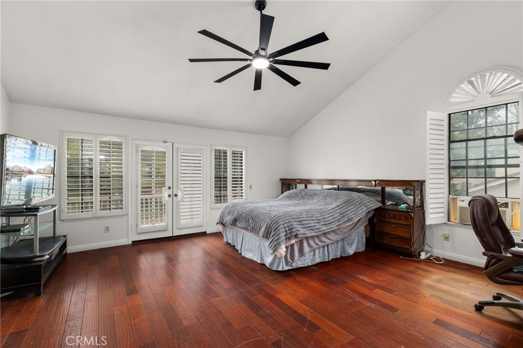 12732 Arena Drive Rancho Cucamonga, CA 91739 - Photo 31 of 61 a bedroom with a bed furniture and a large window