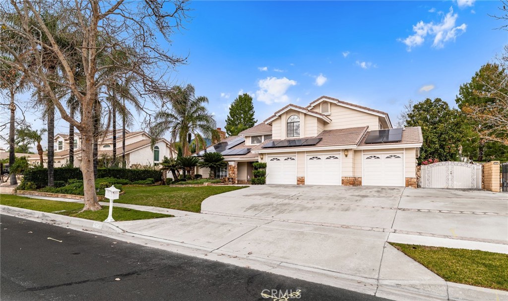 12732 Arena Drive Rancho Cucamonga, CA 91739 - Photo 4 of 61 a view of a house with a yard