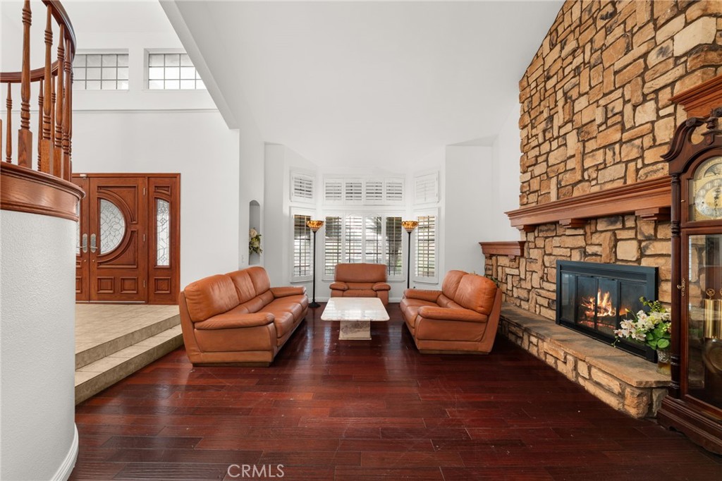 12732 Arena Drive Rancho Cucamonga, CA 91739 - Photo 10 of 61 a living room with furniture and a fireplace