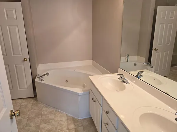 a bathroom with a sink and a bathtub