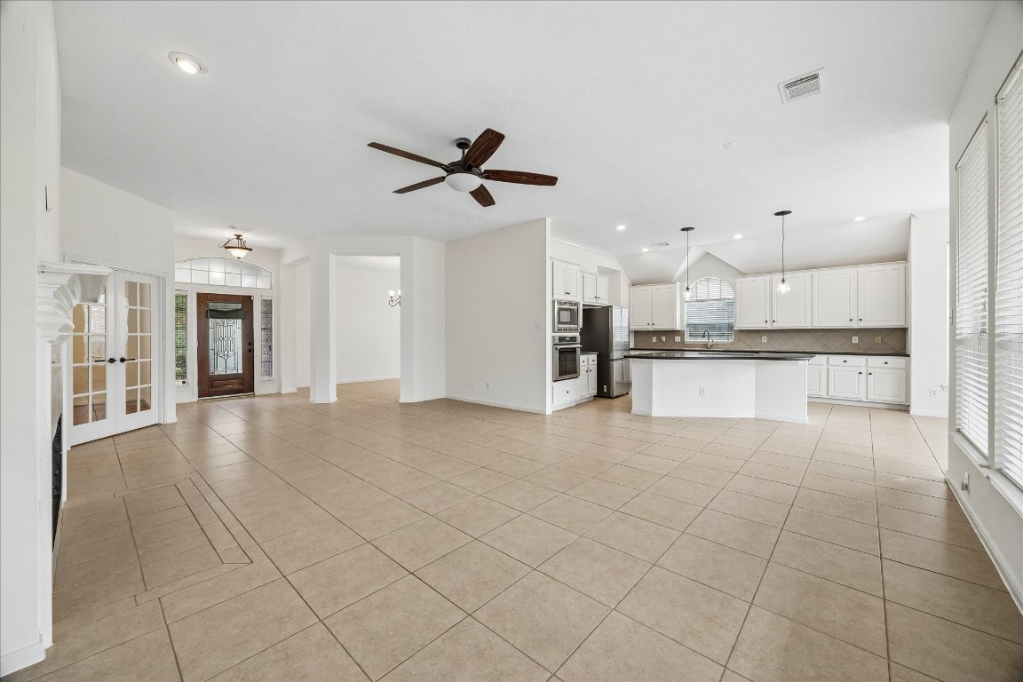 12507 Aliso Bend Lane Houston, TX 77041 - Photo 10 of 25 a view of a kitchen with a sink and cabinets