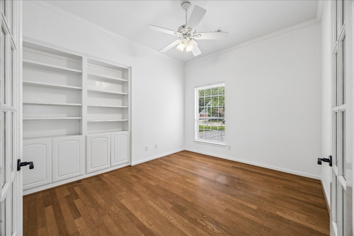 12507 Aliso Bend Lane Houston, TX 77041 - Photo 14 of 25 a view of an empty room with a window