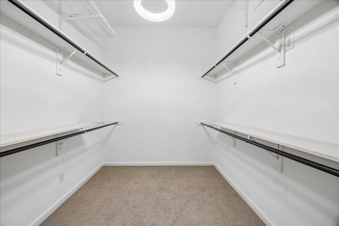 12507 Aliso Bend Lane Houston, TX 77041 - Photo 18 of 25 a view of a room with racks on the wall