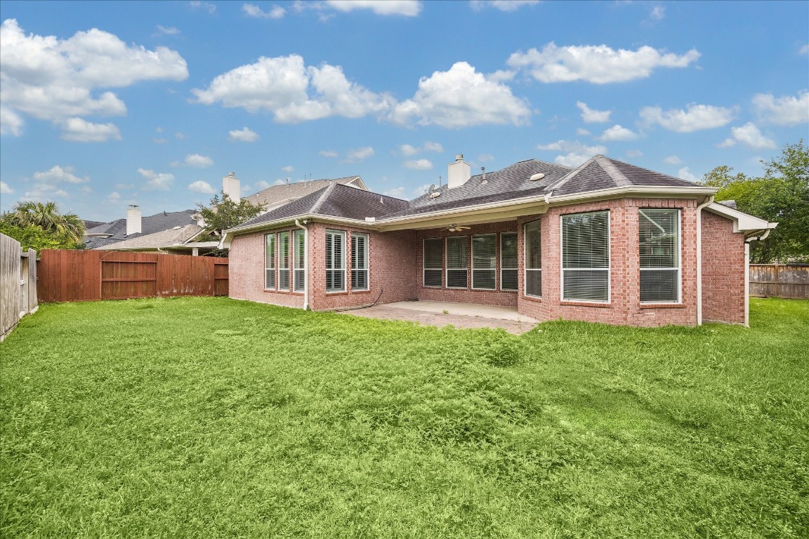 12507 Aliso Bend Lane Houston, TX 77041 - Photo 4 of 25 a view of a house with a backyard