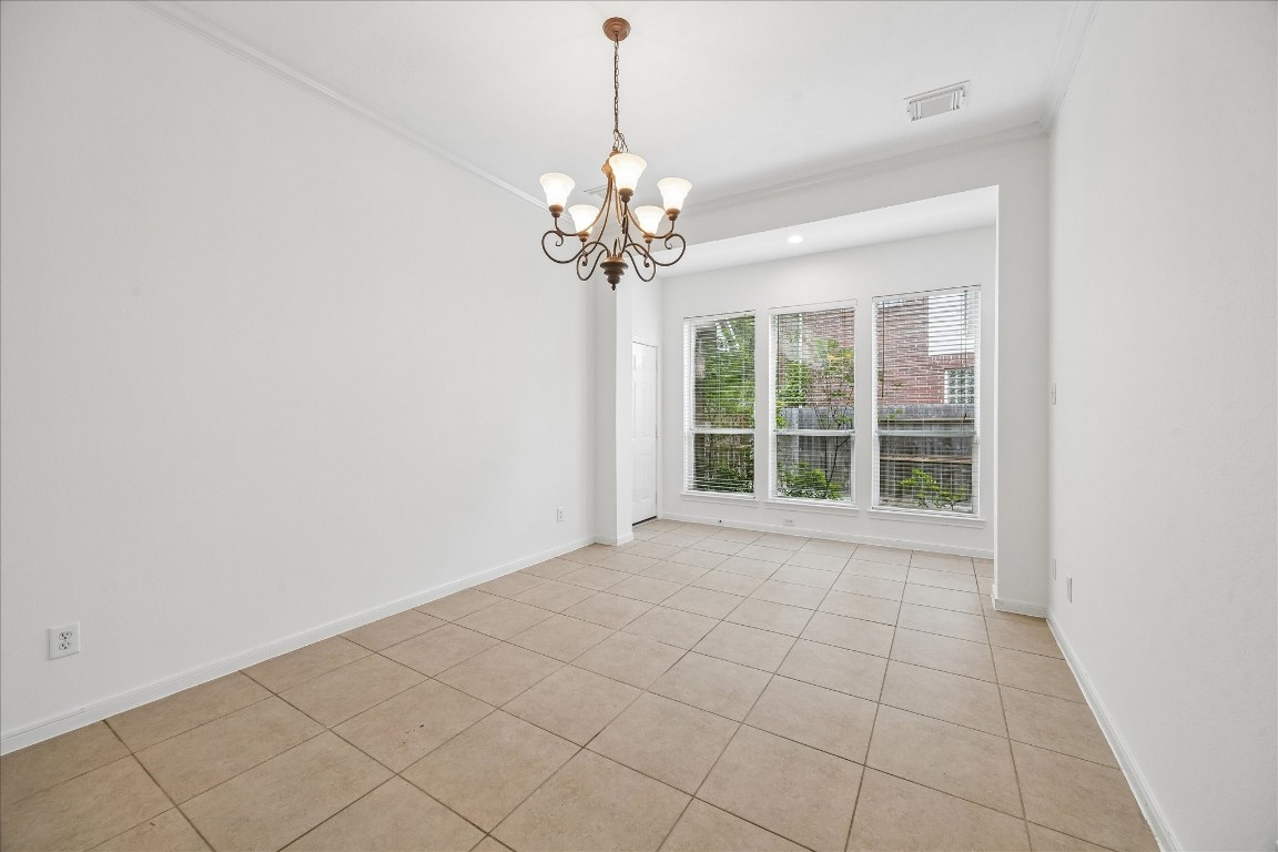12507 Aliso Bend Lane Houston, TX 77041 - Photo 7 of 25 a view of an empty room with a window