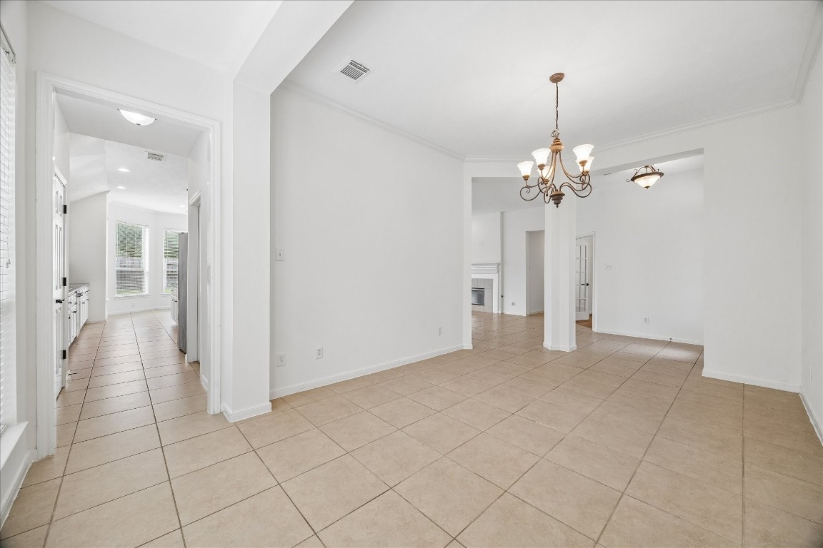 12507 Aliso Bend Lane Houston, TX 77041 - Photo 8 of 25 a view of an empty room and wooden floor