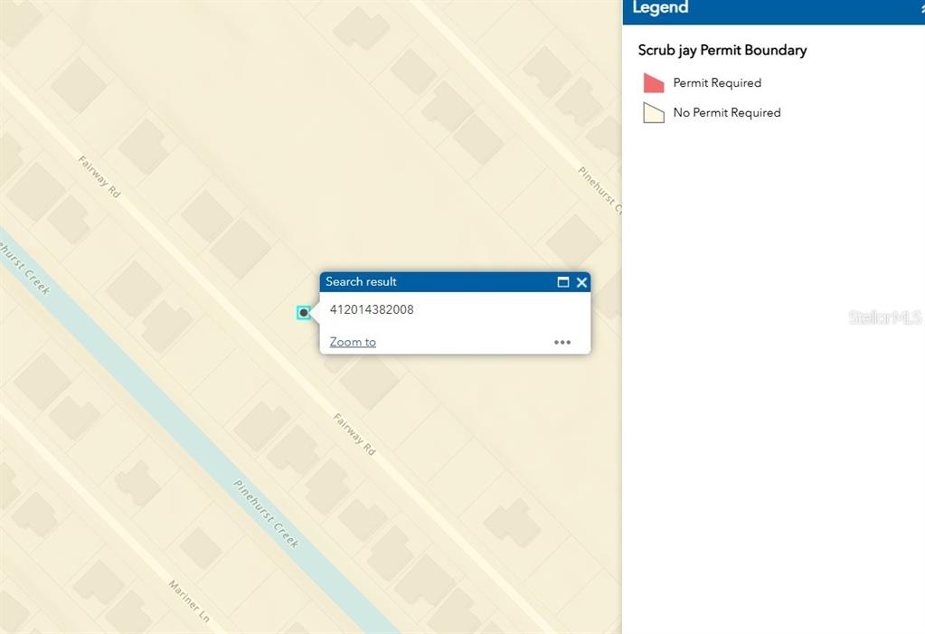 66 Fairway Road Rotonda West, FL 33947 - Photo 5 of 8 a picture of a room with a white wall and a refrigerator